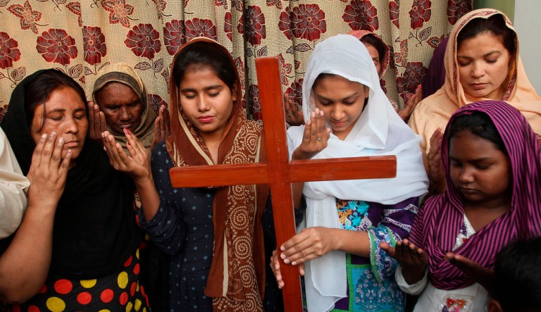 Pakistan Christians pray for Asia Bibi, a Catholic mother of five who has been on death row since 2010 accused of blasphemy in Multan, Pakistan. Wednesday, Oct. 31, 2018. Pakistan's top court on Wednesday acquitted Bibi, who was sentenced to death under the country's controversial blasphemy law, a landmark ruling that sparked protests by hard-line Islamists and raised fears of violence.