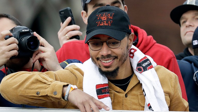 Boston Red Sox's Mookie Betts smiles for the fans.