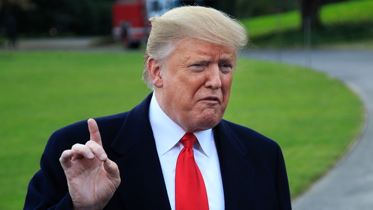 President Trump speaks to members of the media before leaving the White House.