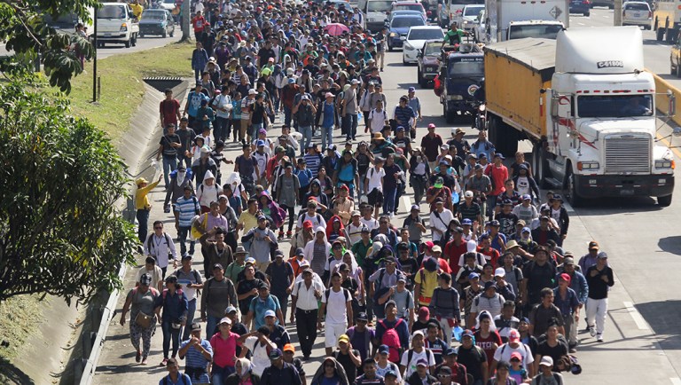 Migrants from El Salvador start on their way to the United States, in San Salvador, El Salvador, Wednesday, Oct. 31, 2018. A third group of migrants from El Salvador had already made it to Guatemala, and on Wednesday a fourth group of about 700 Salvadorans set out from the capital, San Salvador, with plans to walk to the U.S. border, 1,500 miles away.
