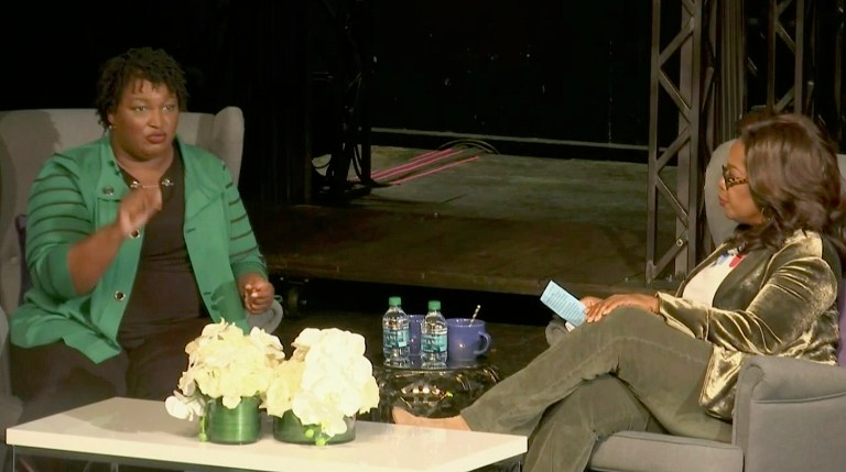 In this image made from video, Georgia Democratic gubernatorial nominee Stacey Abrams, left, speaks with media icon Oprah Winfrey, Thursday, Nov. 1, 2018, in Marietta, Ga.