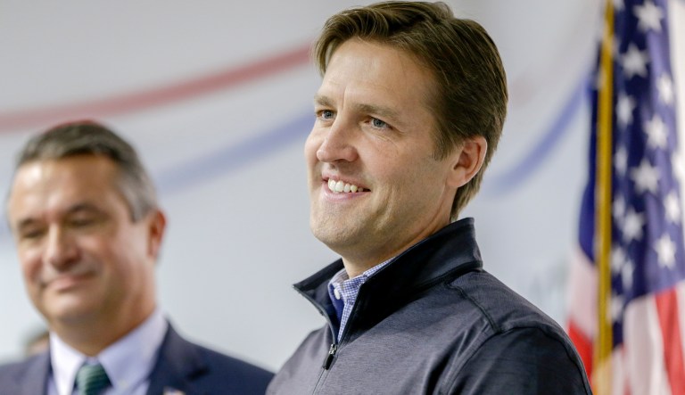 Sen. Ben Sasse, R-Neb., stands on stage with Rep. Don Bacon, R-Neb.,, left, during a Nebraska Republican Party Get Out The Vote rally tour stop in Omaha, Neb., Friday, Nov. 2, 2018.