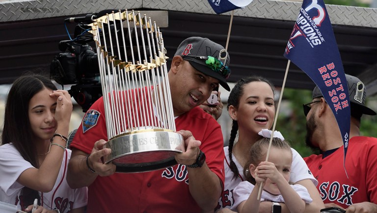 Boston Red Sox manager Alex Cora arrives at his Puerto Rican hometown with the 2018 World Series trophy.