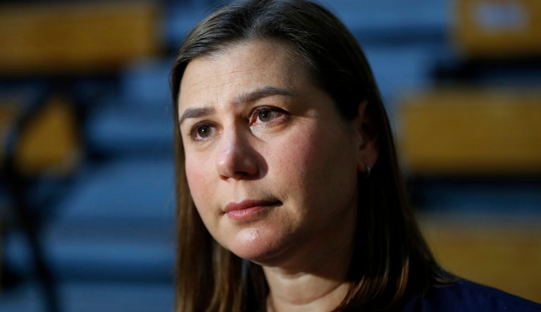 In this Oct. 26, 2018 photo, Elissa Slotkin listens to a question before a rally in Detroit. 