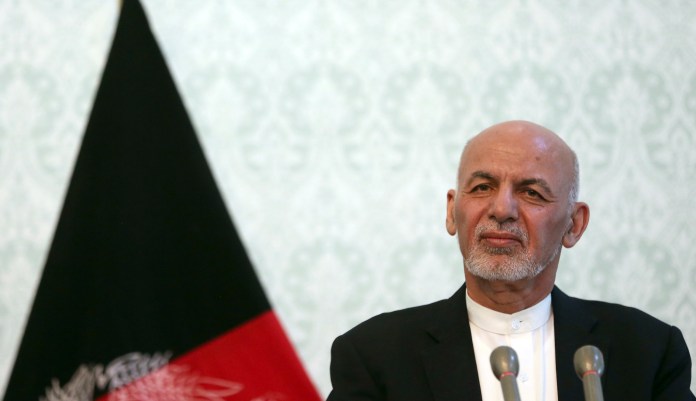 Afghan President Ashraf Ghani, listens during a press conference with NATO Secretary General Jens Stoltenberg, at the presidential palace, in Kabul, Afghanistan, Tuesday, Nov. 6, 2018.