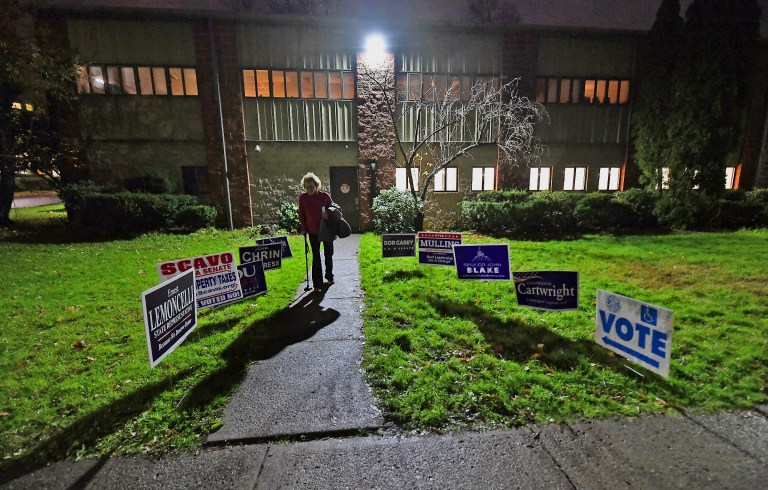 A woman exits the Scranton Hebrew Day School after voting on Tuesday, Nov. 6, 2018, in the Hill Section of Scranton, Pa. 