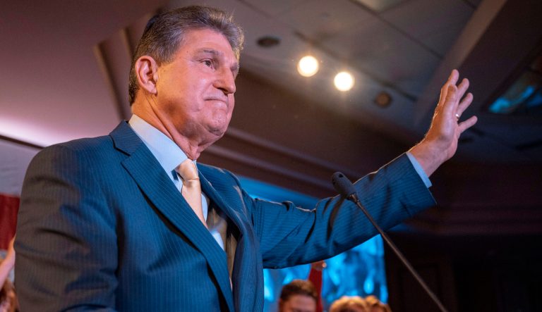 Sen. Joe Manchin, D-W.Va., speaks to his supporters after being re-elected Nov. 6, 2018, in Charleston W.Va. 