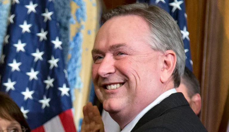 In this Jan. 3, 2013, file photo, Rep. Steve Stockman, R-Texas, participates in a mock swearing-in ceremony in Washington. The disgraced former Texas Congressman will serve 10 years in federal prison for conspiring to bilk at least $775,000 from conservative foundations that intended the donations for charities and voter education. Stockman was convicted in April on 23 of 24 counts, including mail and wire fraud, conspiracy and money laundering. He was sentenced Wednesday, Nov. 7, 2018, in Houston.