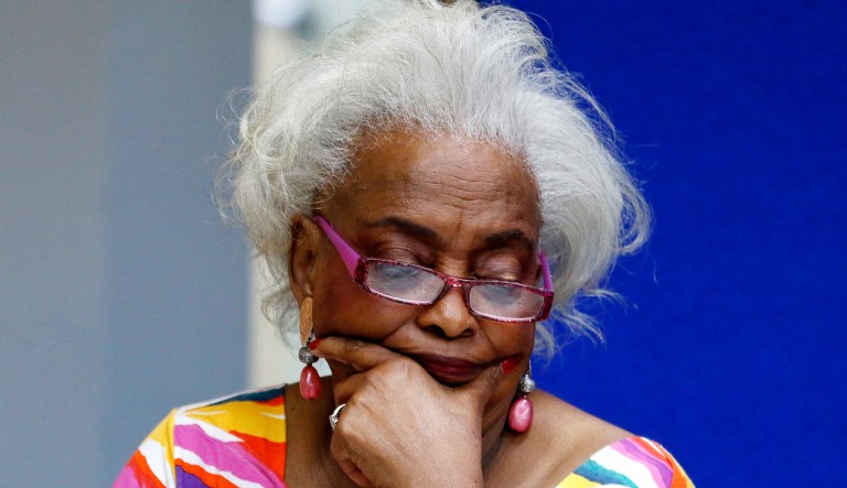 Brenda Snipes, Broward County Supervisor of Elections, looks at a ballot during a canvasing board meeting in Lauderhill, Fla.