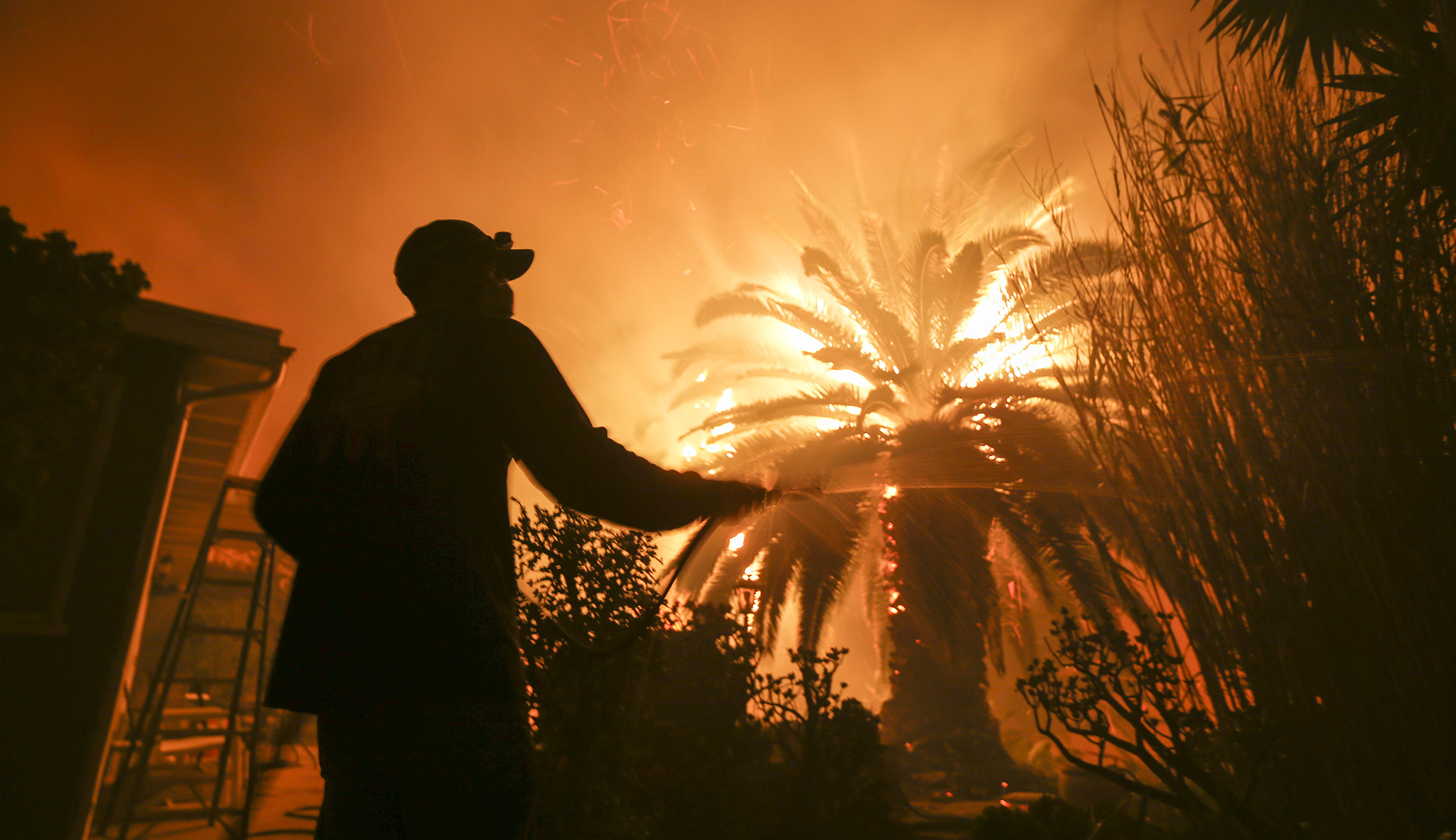 Trump threatens to pull federal funding to California as wildfires ravage state