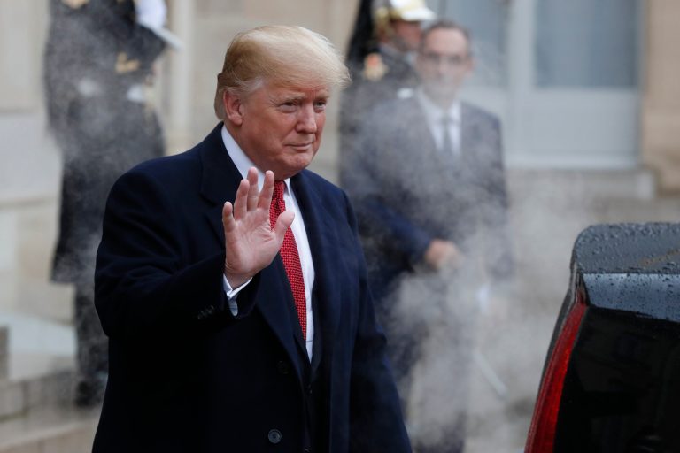U.S President Donald Trump waves outside the Elysee Palace in Paris, Saturday, Nov.10, 2018. Trump is joining other world leaders at centennial commemorations in Paris this weekend to mark the end of World War I.