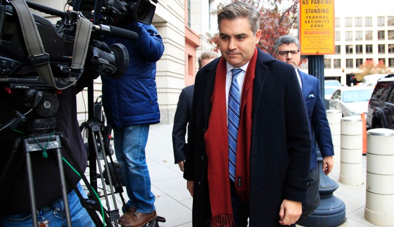 CNN's Jim Acosta walks into federal court in Washington, Wednesday, Nov. 14, 2018, to attend a hearing on legal challenge against President Donald Trump's administration. Trump's administration contends it has "broad discretion" to regulate press access to the White House as it fends off a legal challenge from CNN and other outlets over the revocation of Acosta's "hard pass."