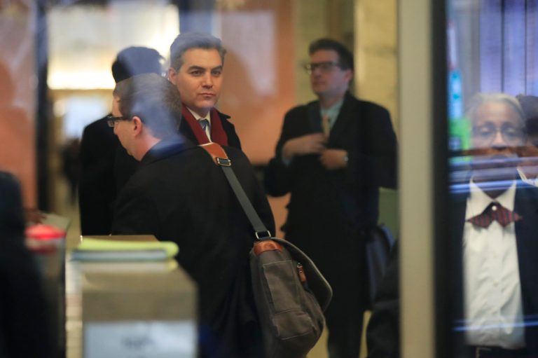 CNN's Jim Acosta goes through security as he enters the federal court in Washington, Wednesday, Nov. 14, 2018, to attend a hearing in a legal challenge against President  Trump's administration. Trump's administration contends it has "broad discretion" to regulate press access to the White House as it fends off a legal challenge from CNN and other outlets over the revocation of journalist Acosta's "hard pass."