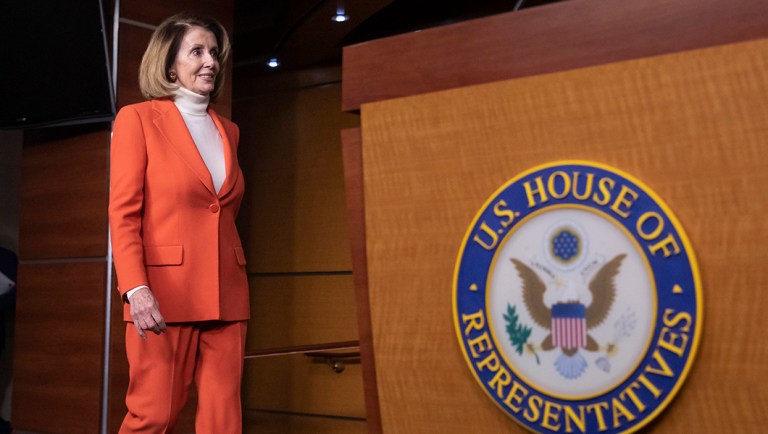 House Minority Leader Nancy Pelosi, D-Calif., arrives to face reporters at a news conference.