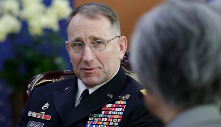 U.S. General Robert Abrams, commander of the United Nations Command, Combined Forces Command, and United States Forces Korea, left, talks with South Korean Foreign Minister Kang Kyung-wha, right, during their meeting at the Foreign Ministry in Seoul, South Korea, Tuesday, Nov. 20, 2018. 