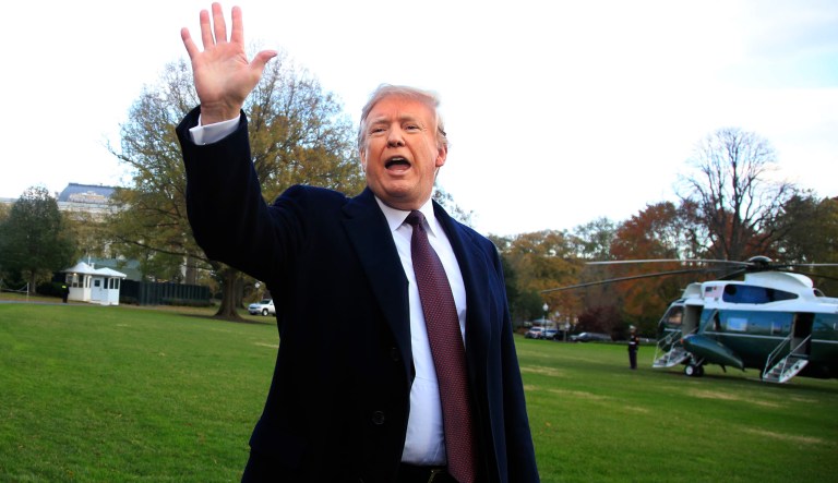 President Donald Trump waves after speaking to the media before leaving the White House in Washington, Tuesday, Nov. 20, 2018, to travel to Florida, where he will spend Thanksgiving at Mar-a-Lago.
