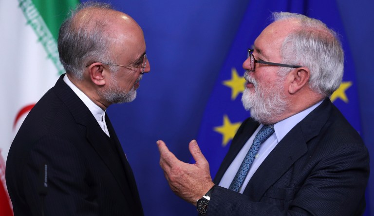 Iran's Vice-President and Head of the Atomic Energy Organisation Ali Akbar Salehi, left, talks to European Union Climate Action and Energy Commissioner Miguel Arias Canete at the end of a news conference at the European Commission headquarters in Brussels, Monday, Nov. 26, 2018.