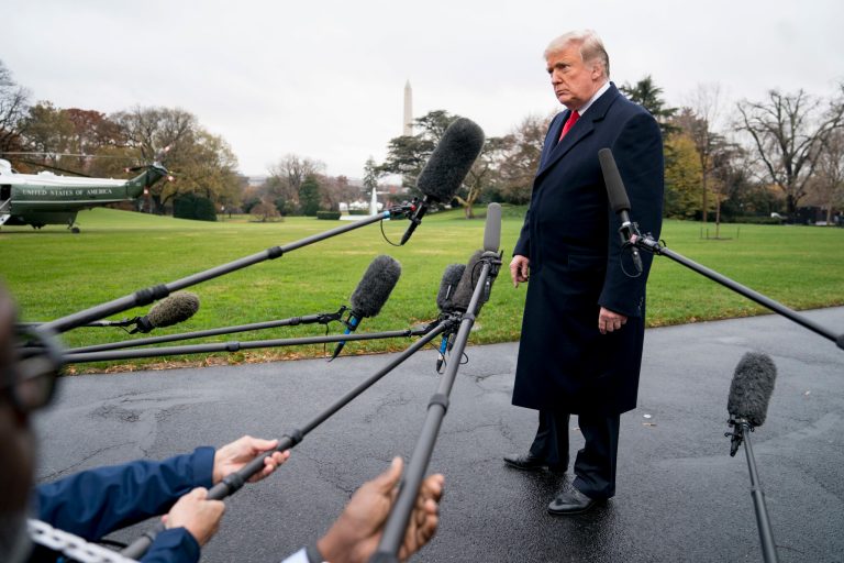 President Donald Trump listens to a question as he speaks to members of the media before boarding Marine One on the South Lawn of the White House in Washington, Monday, Nov. 26, 2018, for a short trip to Andrews Air Force Base, Md., and then on to Mississippi for rallies.