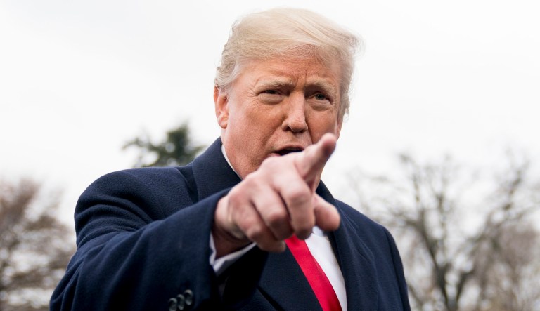 President Trump calls on a reporters as he speaks to members of the media.