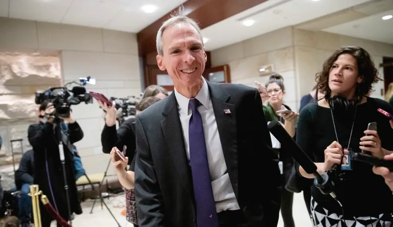 Rep. Dan Lipinski, D-Ill., is met by reporters.
