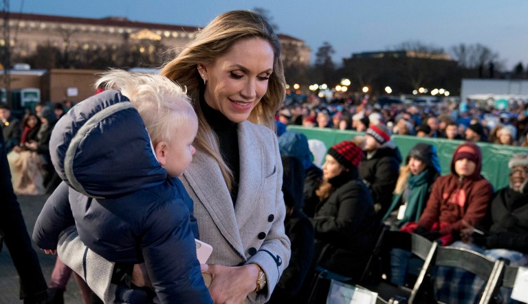 Lara Trump, the wife of Eric Trump, carries her firstborn son Eric.