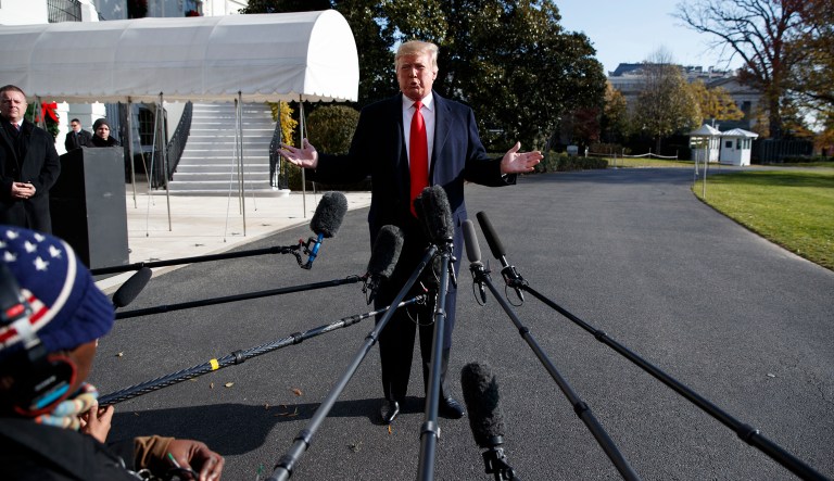 President Donald Trump talks with reporters before traveling to the G20 Summit in Buenos Aires, on the South Lawn of the White House, Thursday, Nov. 29, 2018, in Washington. 