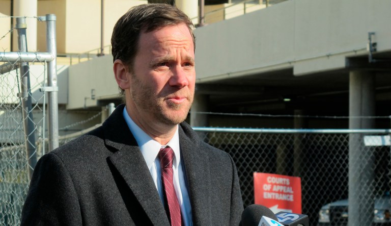 Justin Brown, an attorney for Adnan Syed, talks to reporters outside the Maryland Court of Appeals after arguments in the state's highest court on Thursday, Nov. 29, 2018 in Annapolis, Maryland, in a case that could reinstate Syed's conviction for the slaying of his high school sweetheart. 