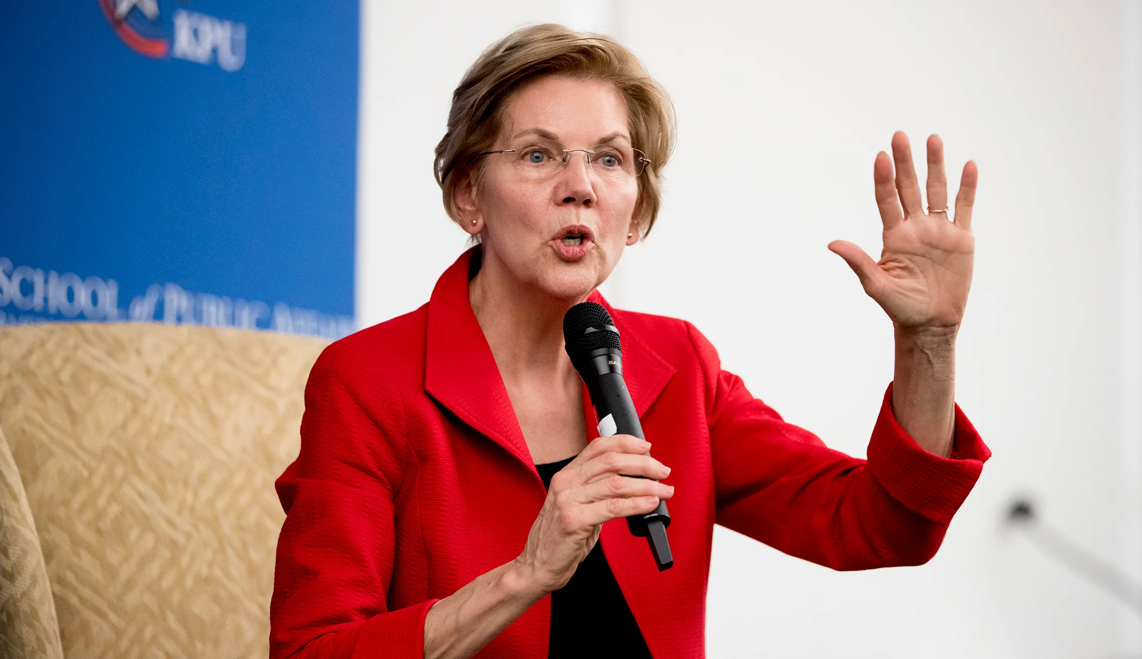 Elizabeth Warren links herself to John F. Kennedy in campaign-style speech