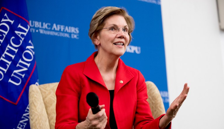 Sen. Elizabeth Warren, D-Mass., reacts while answering a question from the audience at an event.