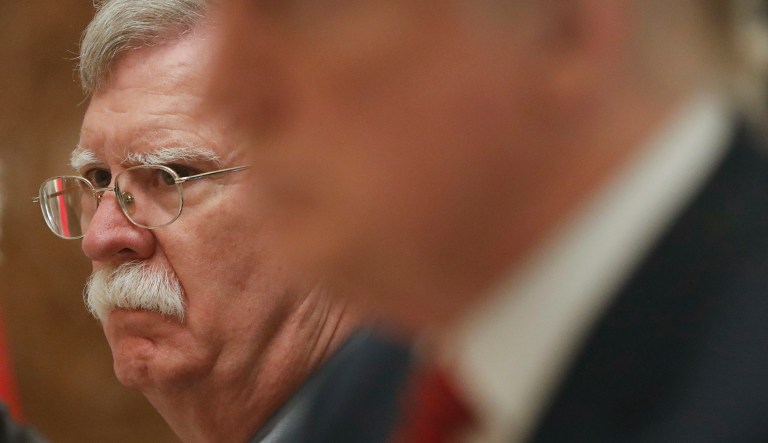 National security adviser John Bolton, left, sits with President Trump, right, as they listen to China's President Xi Jinping speak during a bilateral meeting at the G20 Summit, Saturday, Dec. 1, 2018 in Buenos Aires, Argentina.
