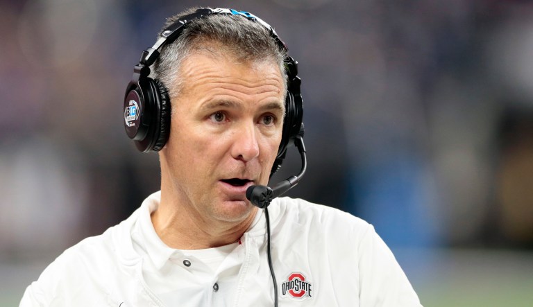 Ohio State head coach Urban Meyer watches from the sidelines during the first half of the Big Ten championship NCAA college football game against Northwestern, Saturday, Dec. 1, 2018, in Indianapolis.