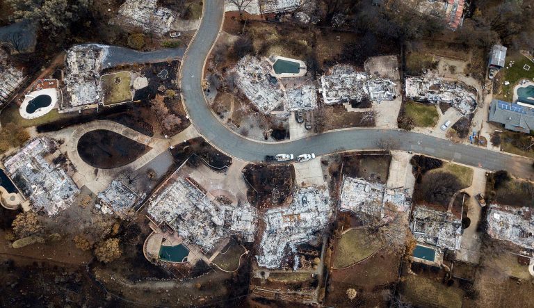 Homes leveled by the Camp Fire line Valley Ridge Drive in Paradise, Calif., on Monday, Dec. 3, 2018. 