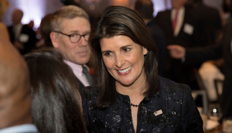 U.S. Ambassador Nikki Haley chats with attendees at an event.