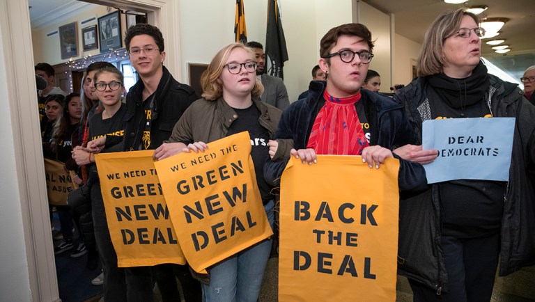 Environmental activists protest for Democratic support for a sweeping agenda to fight climate change.