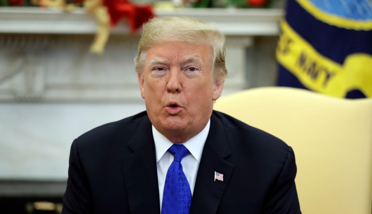 President Trump speaks to the media before meeting with Senate Minority Leader Chuck Schumer, D-N.Y., and House Minority Leader Nancy Pelosi, D-Calif., in the Oval Office of the White House, Tuesday, Dec. 11, 2018, in Washington.