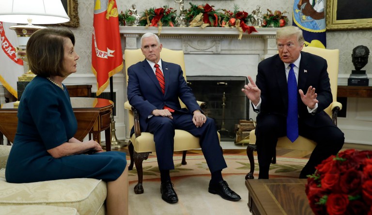 President Trump and Vice President Mike Pence meet with House Minority Leader Nancy Pelosi, D-Calif., left and Senate Minority Leader Chuck Schumer, D-N.Y., not shown, in the Oval Office of the White House in Washington.