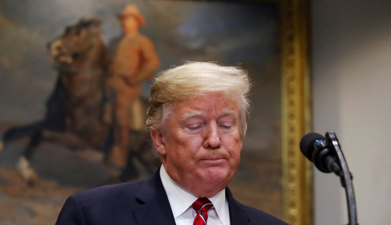 President Trump attends a ceremony to sign an executive order establishing the White House Opportunity and Revitalization Council, in the Roosevelt Room of the White House, Wednesday, Dec. 12, 2018, in Washington.