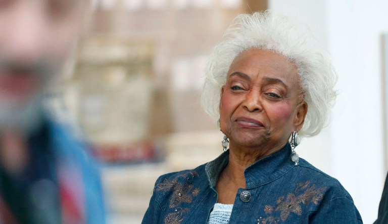 In this Nov. 16, 2018, file photo, Broward County Supervisor of Elections Brenda Snipes watches as Joe D'Alessandro, Election Planning and Development Director, speaks to members of the media after a hand recount in Lauderhill, Fla.