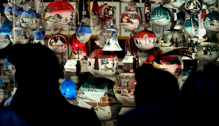 Shoppers look at ornaments.