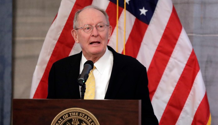 Sen. Lamar Alexander, R-Tenn., speaks at the unveiling of the official portrait of Tennessee Gov. Bill Haslam, Monday, Dec. 17, 2018, in Nashville, Tenn. Alexander said Monday he is not running for re-election in 2020. 