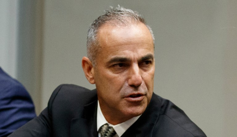 Andy Pollack, father of Parkland victim Meadow Pollack, shakes hands with President Trump during a roundtable discussion in D.C.