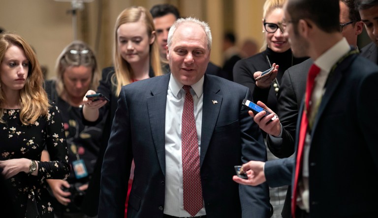 House Majority Whip Steve Scalise, R-Louisiana, is surrounded by reporters as he leaves the chamber.