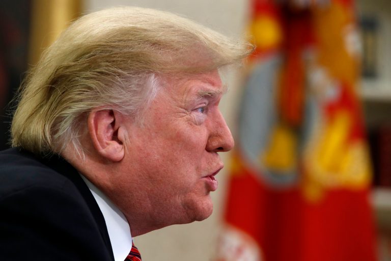 President Donald Trump speaks to members of the five branches of the military by video conference on Christmas Day, Tuesday, Dec. 25, 2018, in the Oval Office of the White House. The military members were stationed in Guam, Qatar, Alaska, and two groups in Bahrain.