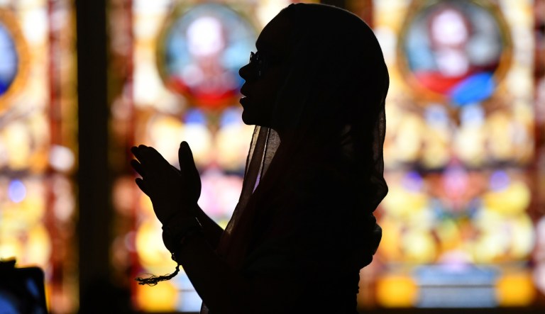 Aniyah Britt,15, of the "Threads of Praise" children's group, portrays the Virgin Mary, mother of Jesus Christ, during a Christmas Day presentation at Christ-Centered Community Church in Johnstown, Pa., Tuesday, Dec.25, 2018. 