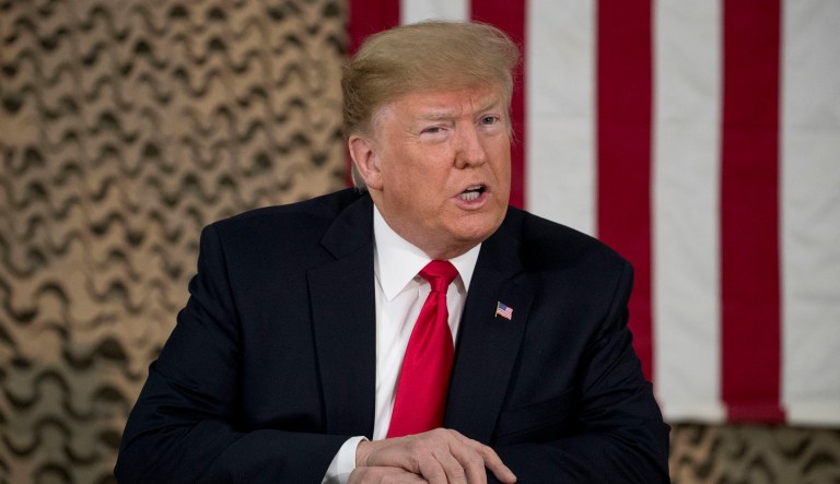 President Trump speaks to members of the media at Al Asad Air Base, Iraq, Wednesday, Dec. 26, 2018. 