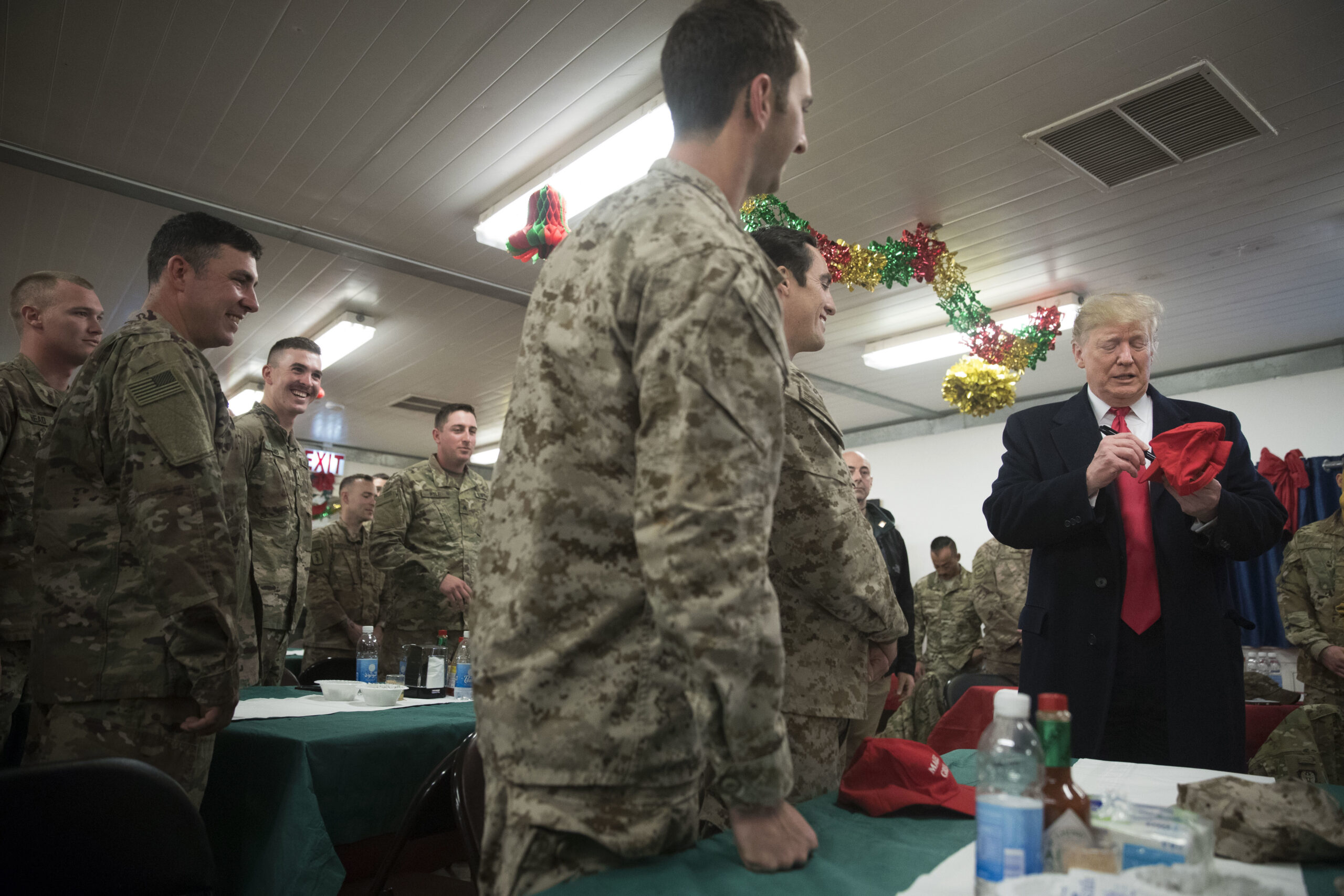 CNN blasts Trump for signing MAGA hats for troops in Iraq