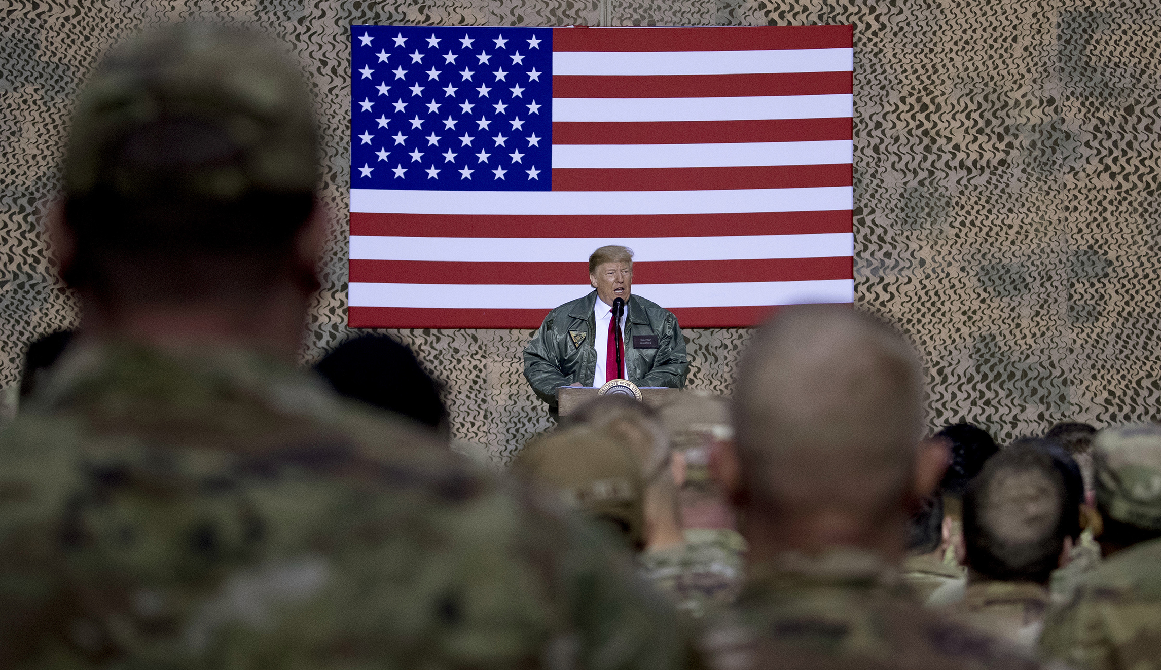 News outlets scramble to fix stories ribbing Trump for not seeing troops during the holidays