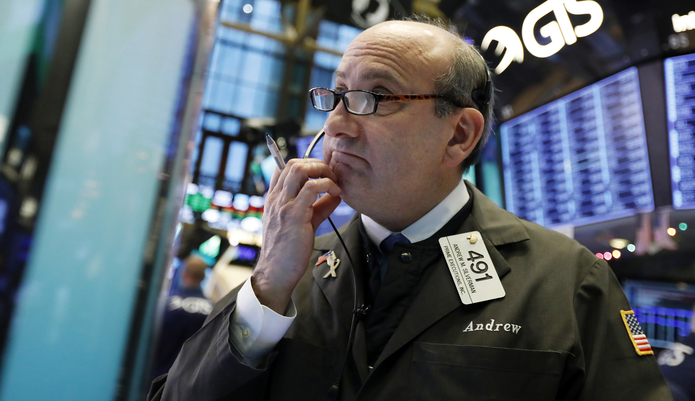 A whiplashed Wall Street builds on Dow Jones’ record-setting gain