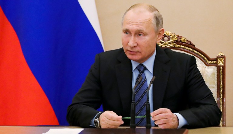 Russian President Vladimir Putin leads a Security Council meeting in the Kremlin in Moscow, Russia, Friday, Dec. 28, 2018. 