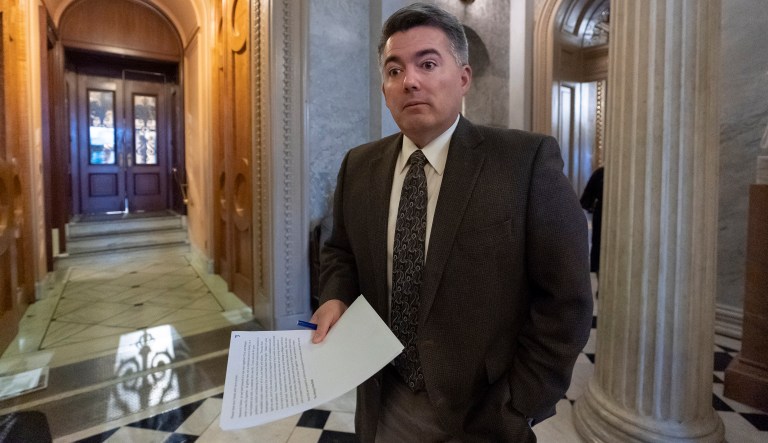 Sen. Cory Gardner, R-Colo., arrives at the Senate Chamber for an abbreviated pro-forma session at the Capitol in Washington, Monday, Dec. 31, 2018, as a partial government shutdown stretches into its second week.